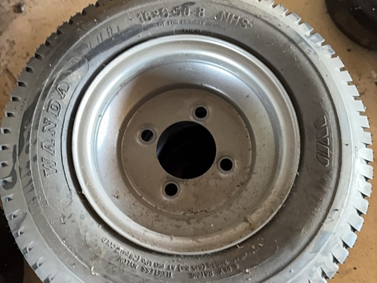 new-pair-of-16x6.50-8-tire-with-4-lug-wheel-image-1