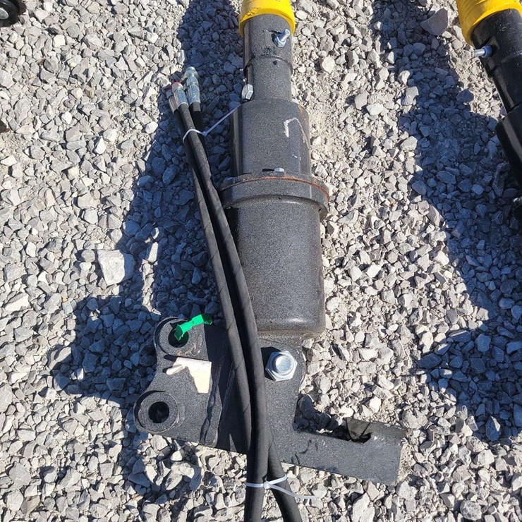 Mini excavator hydraulic wood drill.