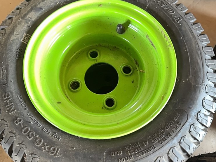 new-pair-of-16x6.50-8-tire-with-4-lug-wheel-image-1