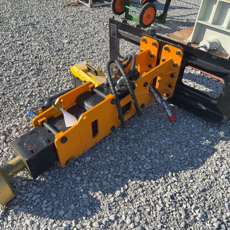 Skid steer post pounder