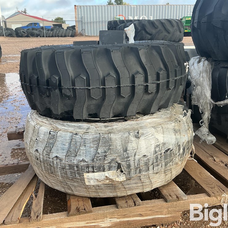 Titan Contractor FWD 12-16.5NHS Tractor Tires W/brackets