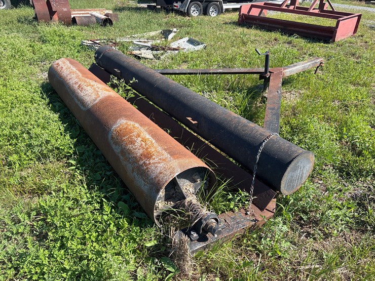 #135-•-lot-with-pull-behind-roller-bar-image-1