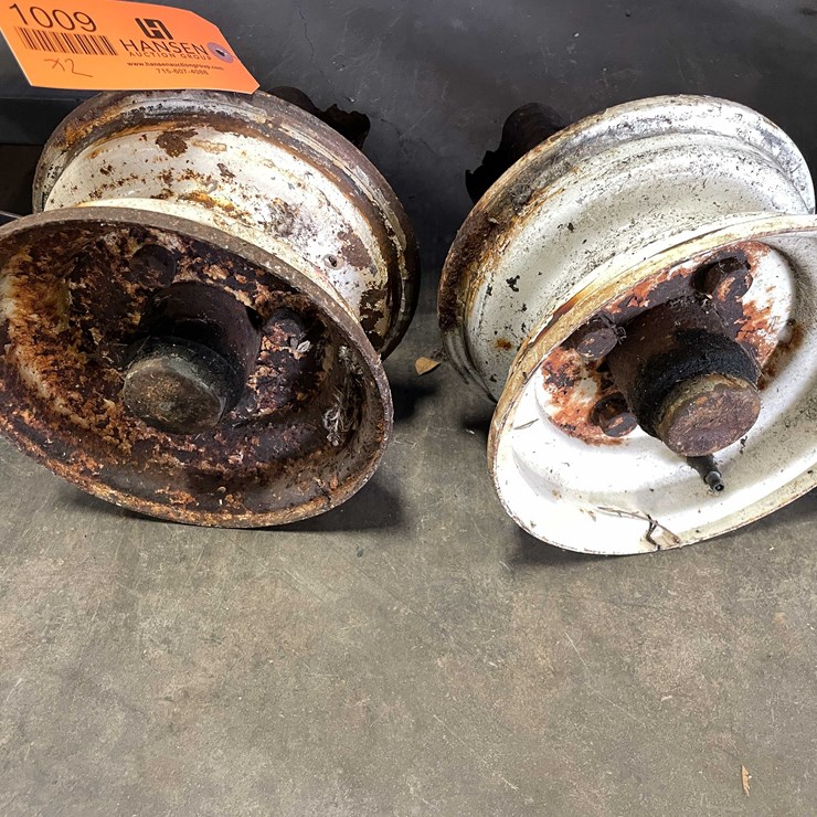 #8516 • (2) 4 Lug Axle Hubs and Spindles (CW)