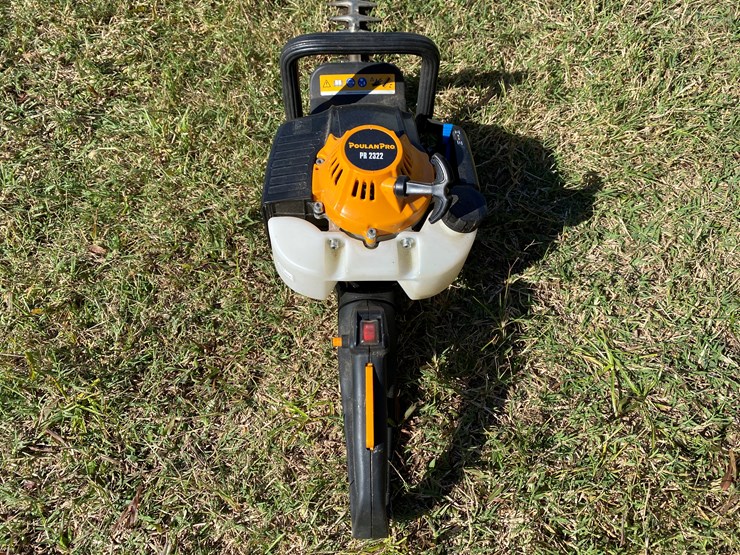 #98-•-#212-•-husqvarna-gas-powered-chain-saw;-poulanpro-gas-powered-hedge-trimmer;-troy-bilt-2-cycle-string-trimmer-image-7