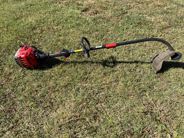 #98-•-#212-•-husqvarna-gas-powered-chain-saw;-poulanpro-gas-powered-hedge-trimmer;-troy-bilt-2-cycle-string-trimmer-image-9