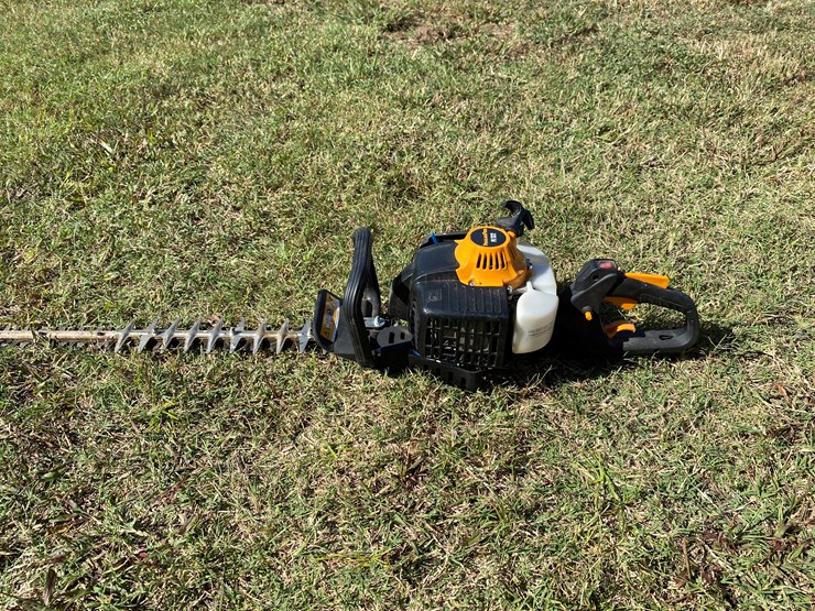 #98-•-#212-•-husqvarna-gas-powered-chain-saw;-poulanpro-gas-powered-hedge-trimmer;-troy-bilt-2-cycle-string-trimmer-image-6