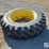 multi-trac-l/s-rear-tractor-16.9x34-bar-tire-on-john-deere-rim-image-1