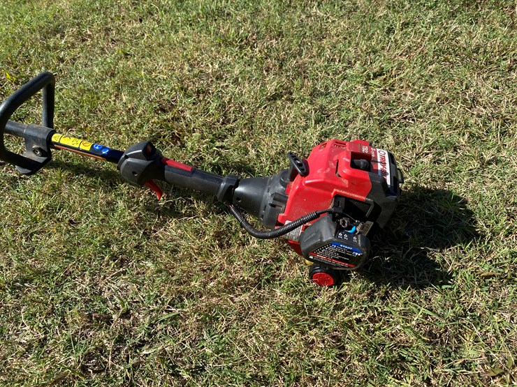 #98-•-#212-•-husqvarna-gas-powered-chain-saw;-poulanpro-gas-powered-hedge-trimmer;-troy-bilt-2-cycle-string-trimmer-image-12