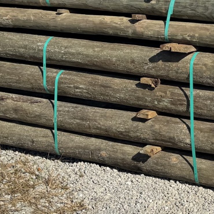#13011 • (28) Treated Wood Post 6"x8'