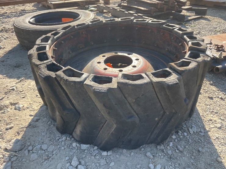 #1026-•-solid-skidsteer-wheel-and-tire-image-1