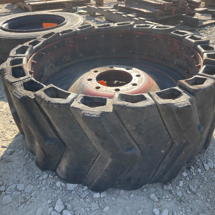 #1026 • Solid Skidsteer Wheel and Tire