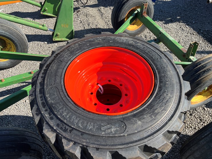 #837-•-4)-12/16.5-skidsteer-tires-&-wheels-image-1