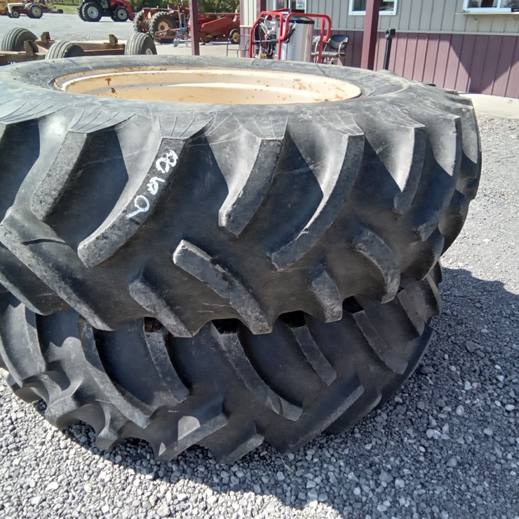 #869 • Titan 18.4-34 0n 9 bolt rims