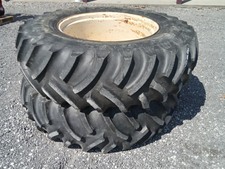 #869-•-titan-18.4-34-0n-9-bolt-rims-image-3