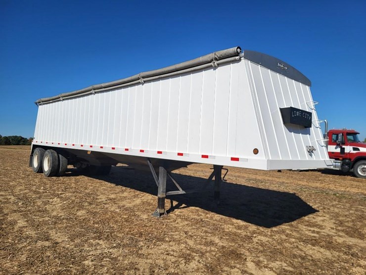 2021-lime-city-equipment-steel-tandem-axle-semi-hopper-trailer---one-owner-image-1