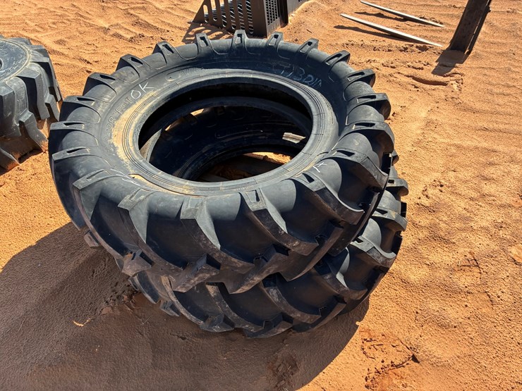 #t13210-•-new-(2)-16.9x28-tires-image-1