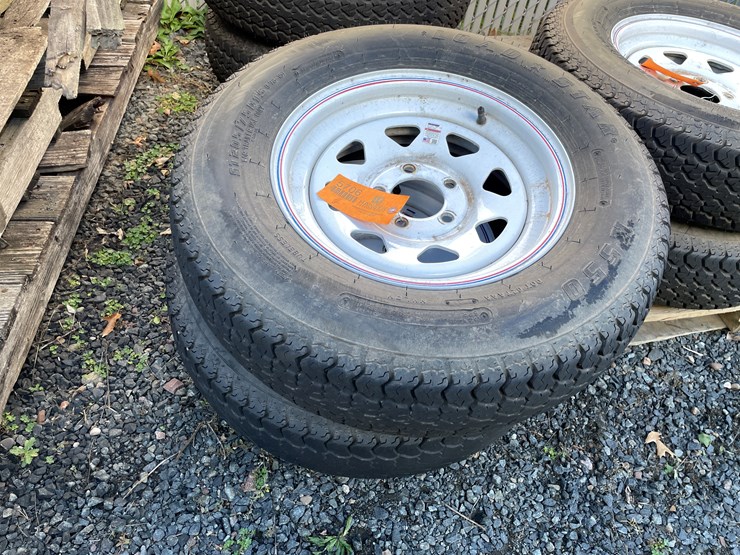 #5706-•-(2)-st205/75d15-tires-on-5-bolt-rims-image-1