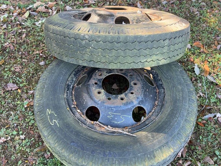 2-8.25-20-truck-tires-and-rims-on-10-bolt-image-1