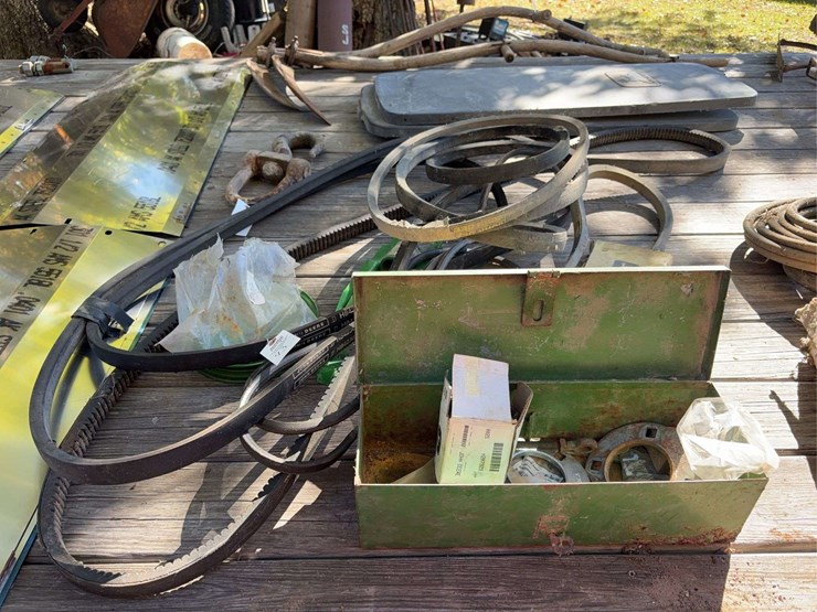 new-john-deere-combine-belts-and-parts,-pulleys,-and-toolbox.-image-1