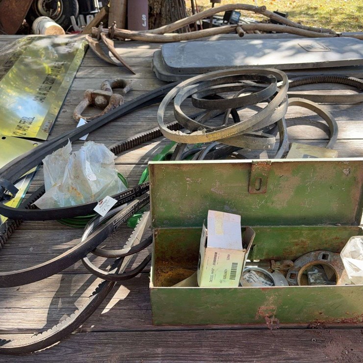 New John Deere Combine Belts and Parts, pulleys, and toolbox.
