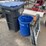 #14072-•-(2)-trash-cans-and-a-pair-of-plastic-sawhorses-(o3)-image-1