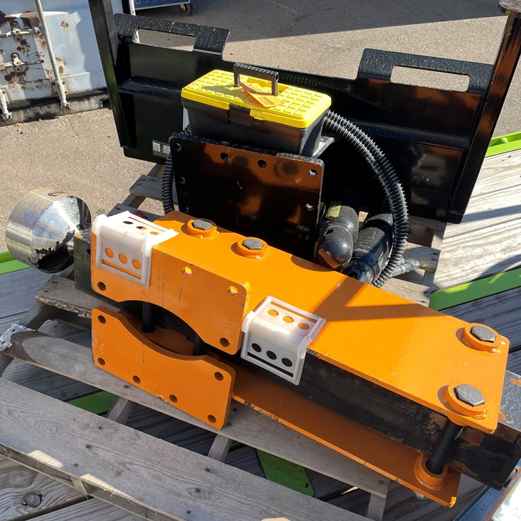 #5654 • Wolverine Unused Skid Steer Post Driver