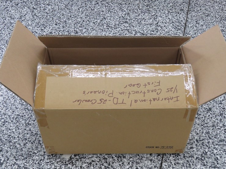 international-td-25-crawler-1/25-contruction-pioneer-first-gear-original-box-opened/wrote-on-tissue-image-8