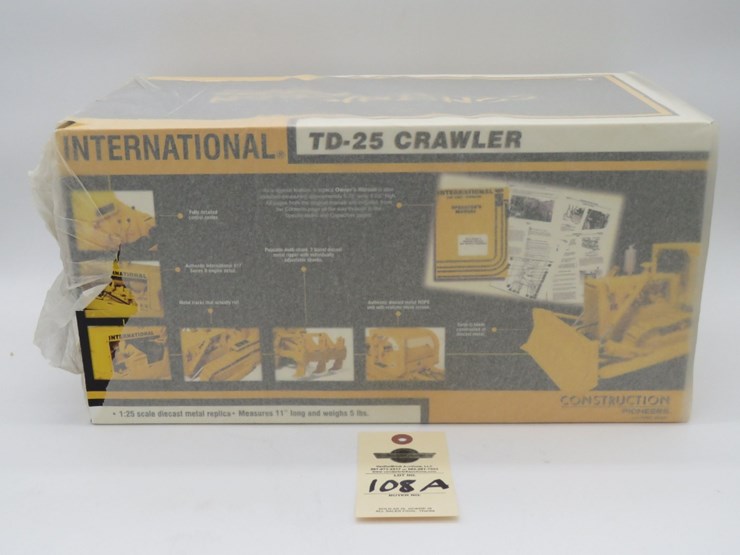 international-td-25-crawler-1/25-contruction-pioneer-first-gear-original-box-opened/wrote-on-tissue-image-5