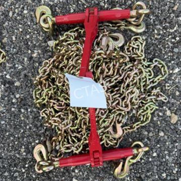 #42 • (4) 5/16" 20' Chains & (2) 5,400 lb Boomers