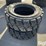 bkt-powertrax-hd-10-16.5-skid-steer-tires-image-1