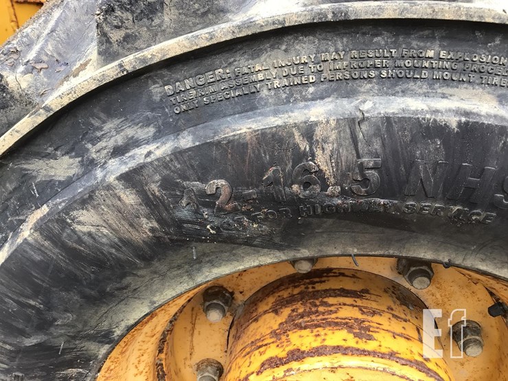 2004-deere-310g-image-25