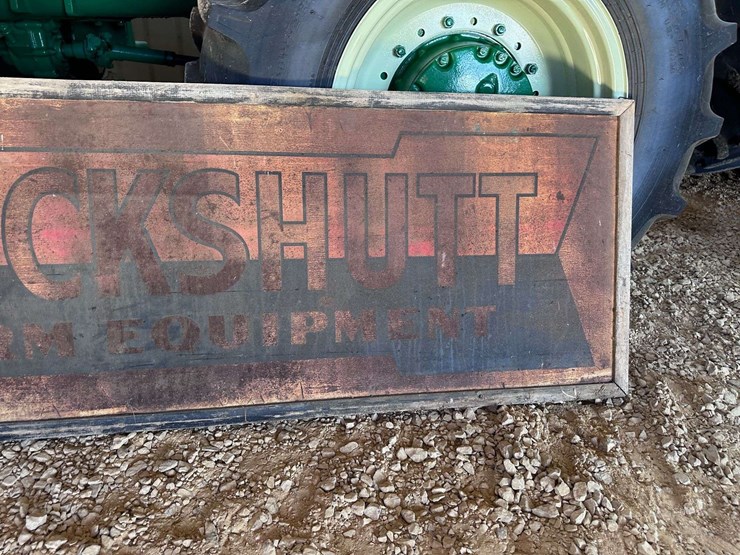 cockshutt-farm-equipment-metal-sign-with-wood-frame-image-4
