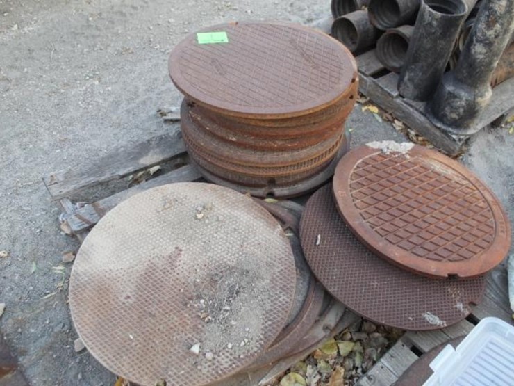 pallet-of-16-man-hole-covers,-+/--2-ft.-image-1