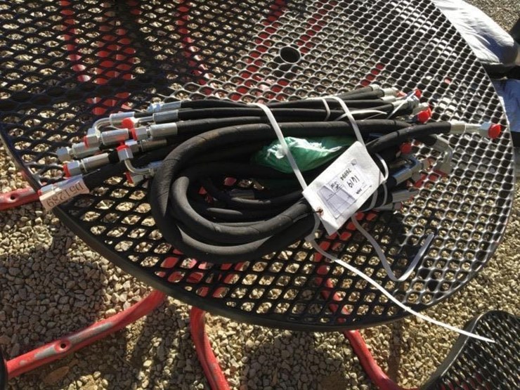 bundle-of-unused-hydraulic-hoses.-image-1