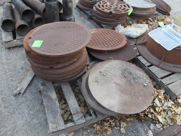 pallet-of-16-man-hole-covers,-+/--2-ft.-image-2