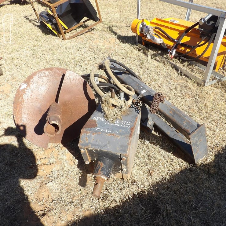 NEW HOLLAND POST HOLE DIGGER