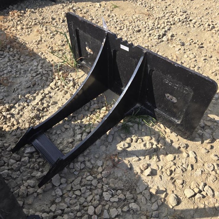 #5889 • NEW SKID STEER ROCK DIGGER