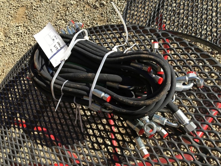 bundle-of-unused-hydraulic-hoses.-image-1