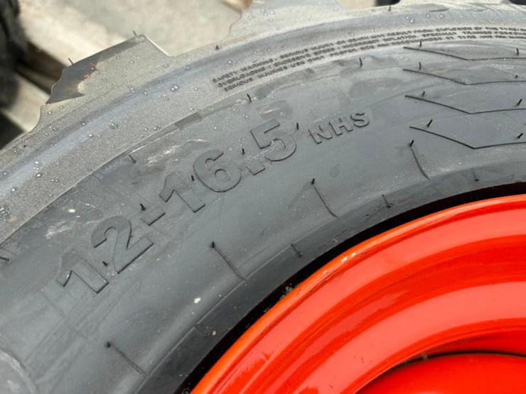 12-16.5-tires-on-wheels-for-bobcat-(set-of-4)-image-4
