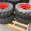 12-16.5-tires-on-wheels-for-bobcat-(set-of-4)-image-2