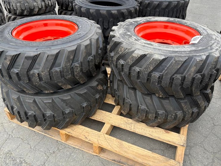 12-16.5-tires-on-wheels-for-bobcat-(set-of-4)-image-1