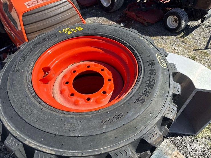 set-of-4-10-16.5-bobcat-wheels-and-tires-image-1