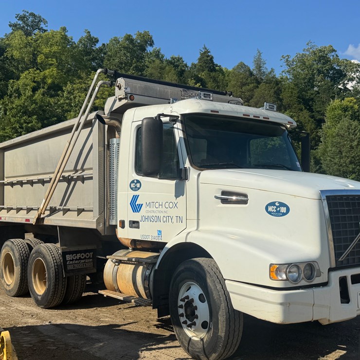 #1302 • 2002 Volvo VHD Truck with stainless dump bed