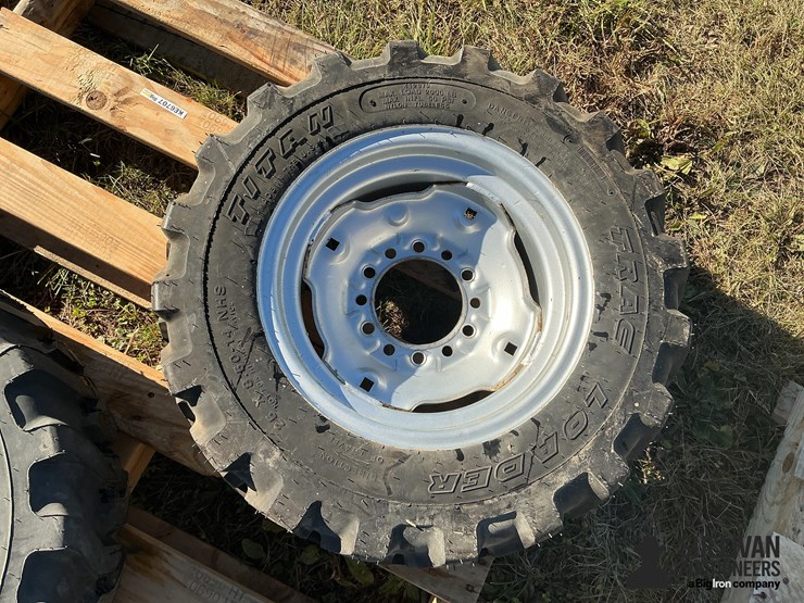 titan-trac-loader-25x8.50-14nhs-tires-on-6-bolt-rims-image-2