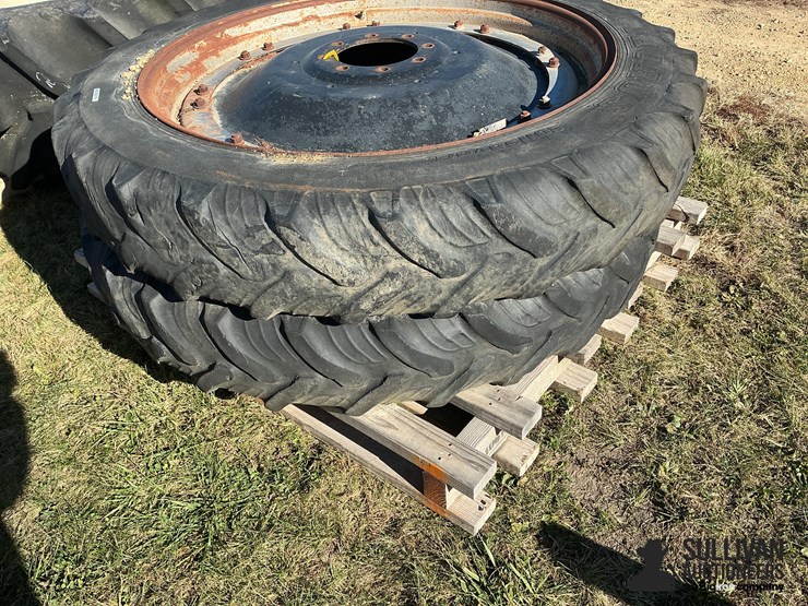 taurus-300/95r46-tires-on-8-bolt-rims-image-1