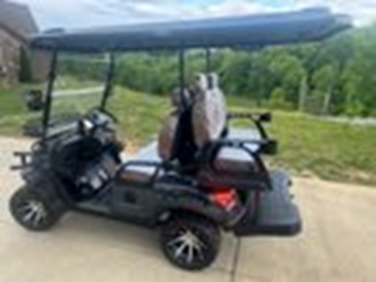 #1200-•-battery-powered-golf-cart-image-1