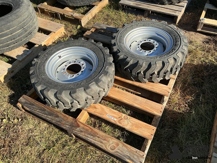 titan-trac-loader-25x8.50-14nhs-tires-on-6-bolt-rims-image-1