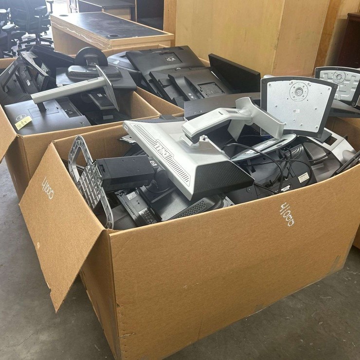 Bins of Monitors, Stands and Dock Stations