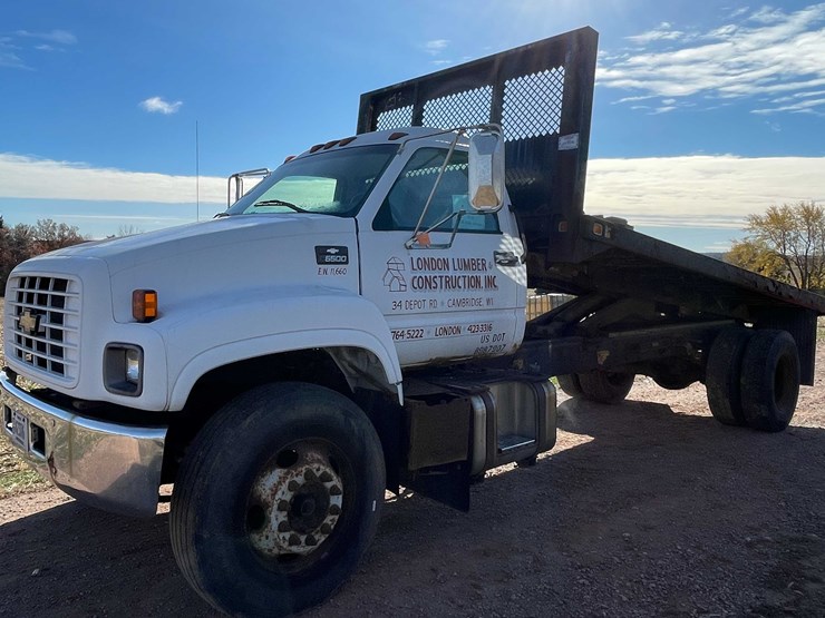 #3006-•-1999-chevy-c6500-single-axle-dump-flatbed-truck-(title-in-delay)-image-1