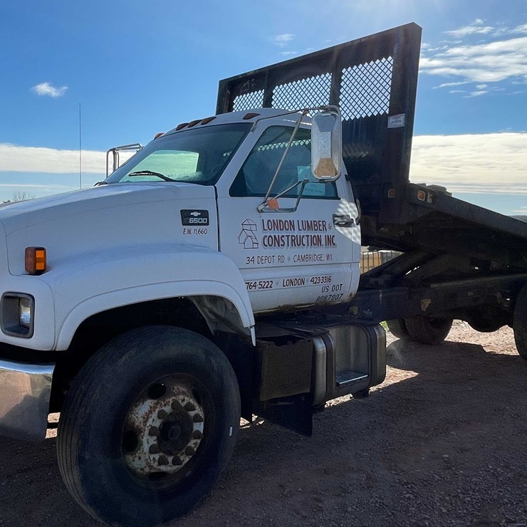 #3006 • 1999 Chevy C6500 Single Axle Dump Flatbed Truck (Title in Delay)